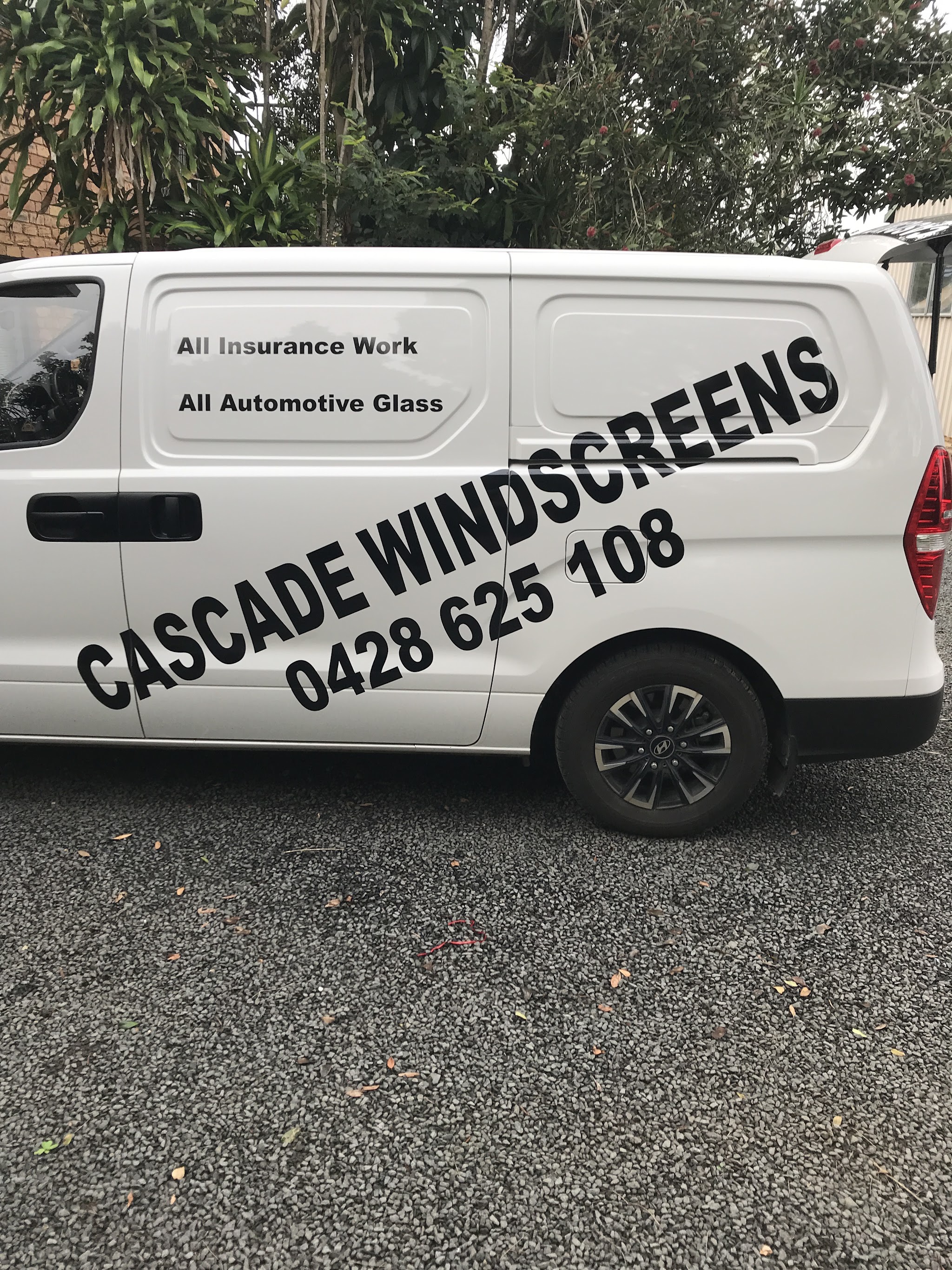 The side of the Cascade Windscreens van, signwritten with All Insurance Work and All Automotive Glass